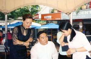 Xue Bing, Timothy and Alice discussing a performance